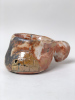 Knauf 2026, 16 x 8,5cm, wood kiln fired/ Holzbrand ~ 1300°C/ 68h, wild clay slip/ Shino/ Slipglasur aus wildem Ton Steine des ungesiebten Tones schmelzen aus und bleiben als Mäuselöcher zurück. Ob es sich hier um den Knauf oder den Schweif von Jolly Jumper handelt, bleibt euch überlassen./ Stones from the unsieved clay melt out during firing, leaving behind tiny mouse-hole traces. Whether this is the pommel or the tail of Jolly Jumper is up to your imagination.220 Euro&nbsp;&nbsp;Inquire&nbsp;