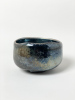 Blauer Stern2026, 7,5 x12 cm, wilder Ton, Slipglasur/ wild clay, slip glaze&nbsp;Holzbrand ~ 1380°C, 65h / wood kiln fired&nbsp;Hier verwendeten wir lokalen wilden Lehmton der als Schlick aufgetragen wurde. Bei sehr hohen Temperaturen schmilzt dieser besondere Ton schwarz aus, entwickelt&nbsp; blau - weiße Kaskaden und schillernde, irisierende metallische Farben / Here we used local, wild clay, which was applied as a slip. At very high temperatures, this special clay melts to a black color, develops blue-white cascades, and shimmering, iridescent metallic colors.SOLD
