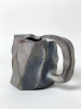 dusk shaker 2026, 9,5 x 13cm, wood kiln fired/ Holzbrand ~ 1300°C/ 68h, wild clay slip/ Slipglasur aus wildem Ton Wie aus dem All, ein Bruchstück eines Asteroiden oder doch ein Impaktit ? Auf jeden Fall ist diese Kännchen not from this planet! / As if from outer space—a fragment of an asteroid, or perhaps an impactite? Either way, definitely this little pitcher is not from this planet. SOLD&nbsp;