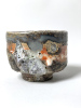 landseasky2024, 11x8 cm, wilder Ton, Shino, gedreht / wild clay, Shino, wheel thrown,&nbsp;Holzbrand ~ 1300°C, 65h / wood kiln firedDie drei Ebenen aus wilden Tonschlickern und Shino – Land, Meer und Himmel – verschmelzen fließend um das Gefäß. Der herabrinnende Ton hat eine dicke Kruste gebildet, die an zerklüftete Felsen oder ein Gebirge erinnert./Three layers of wild clay slips and Shino—Land, Sea, and Sky—merge fluidly around the vessel. The cascading clay has formed a thick crust, reminiscent of rugged rocks or a mountain range.&nbsp;160 Euro&nbsp;Inquire&nbsp;