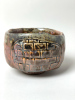 Brickwall 2026, 9 x 13 cm, wood kiln fired / Holzbrand ~ 1360°C/ 68h wild clay slip /shino/ Slipglasur aus wildem Ton Diese handgeformte Schale wurde der Flamme extrem ausgesetzt, hier verschmelzen eine besondere Erde aus Griechenland mit Shino. Ein Handschmeichler./This hand-formed bowl was exposed to extreme flame, where a special clay from Greece merges with Shino. A true pleasure to hold.&nbsp;340 Euro&nbsp;Inquire